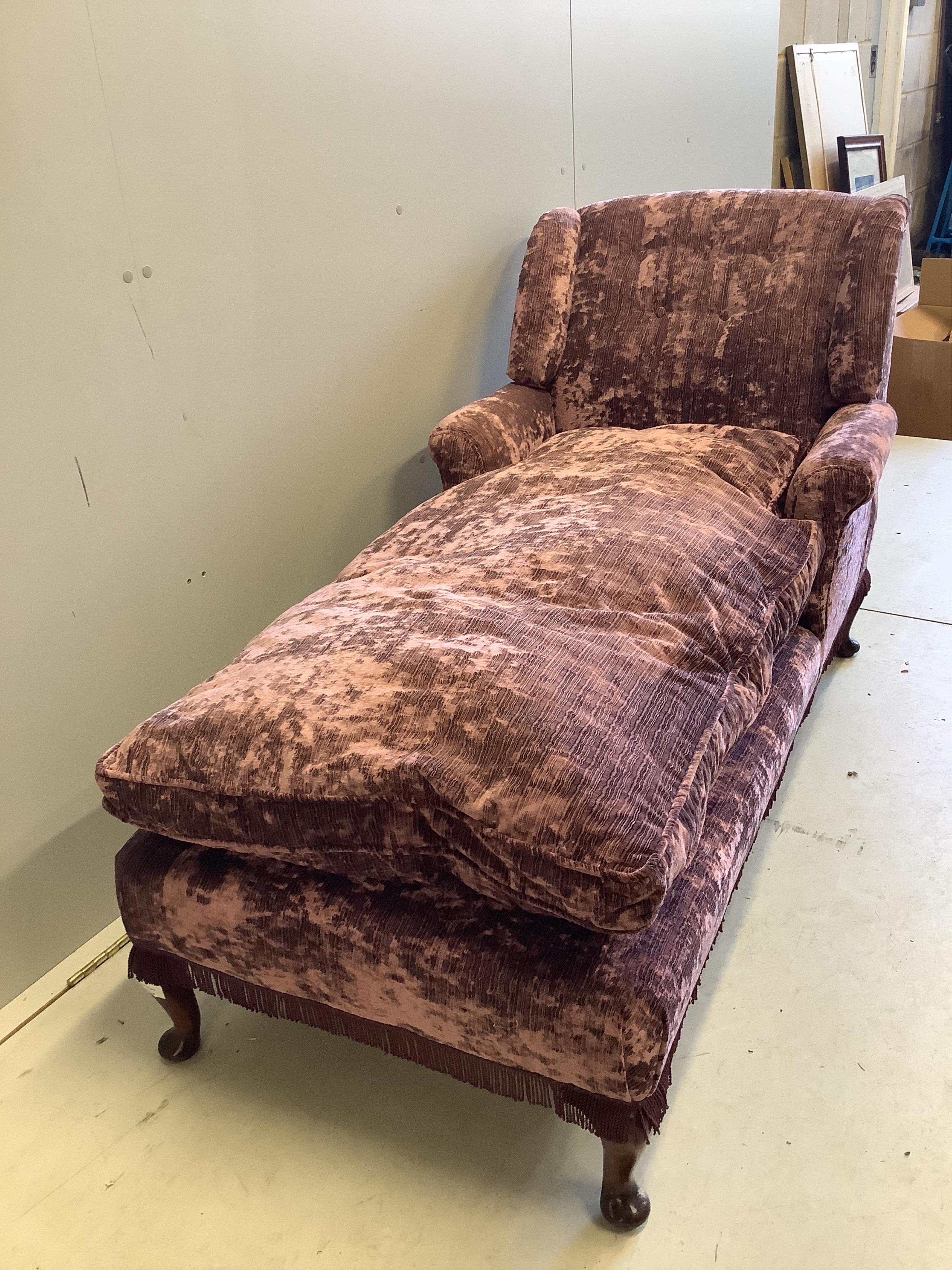 An early 20th century day bed, re-upholstered in contemporary buttoned purple fabric, width 160cm, depth 67cm, height 84cm. Condition - good